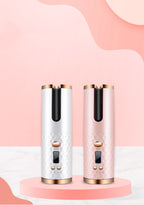 Automatic hair curler in rose gold and white — front view