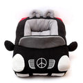 Small dog resting inside red car-shaped pet nest — cosy plush pet bed lifestyle shot